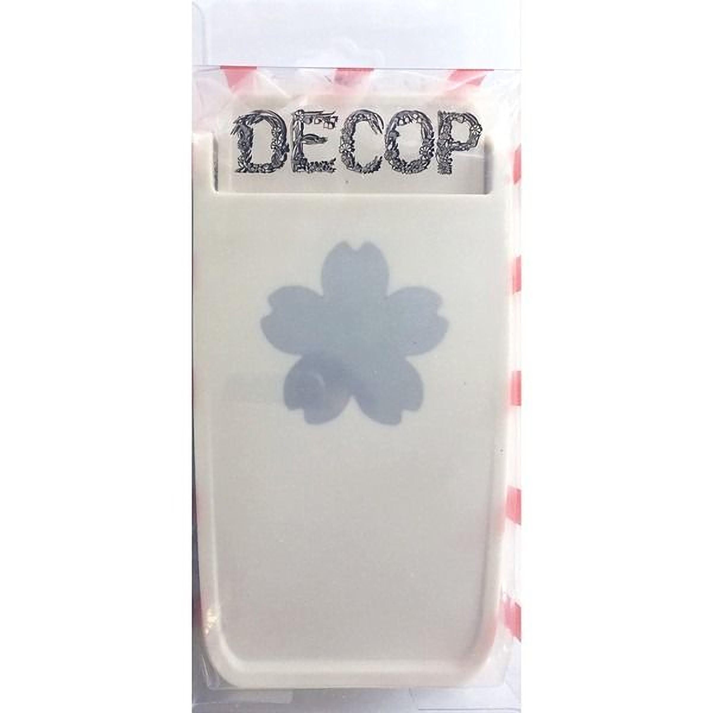 a white plastic container with a blue flower design on it.