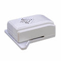 A white, rectangular, and flat-shaped object with a black design on it.