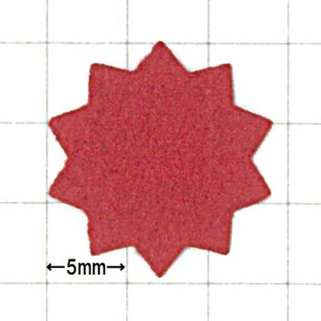 a red star-shaped object with a measurement scale indicating it is 5 millimeters in size.