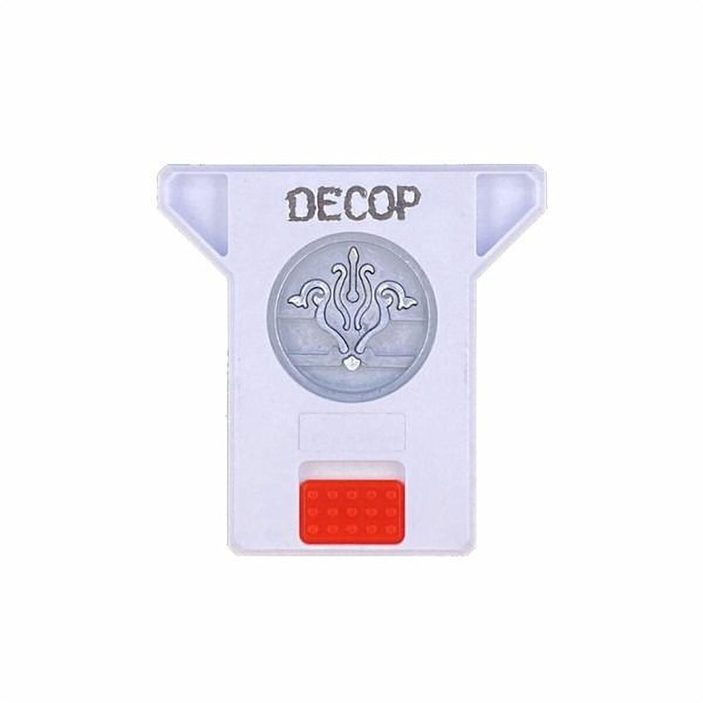A white plastic object with a red and silver design on it, and the word "DECOP" written on it.
