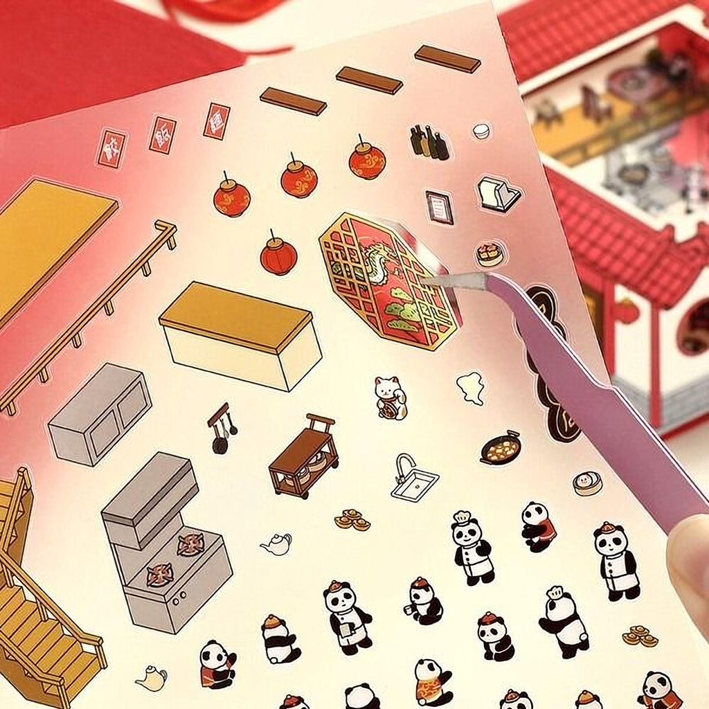 The image is a collage of various cartoon-style illustrations, including a panda, a house, and other objects, with a pink tool being used to pick up one of the items.
