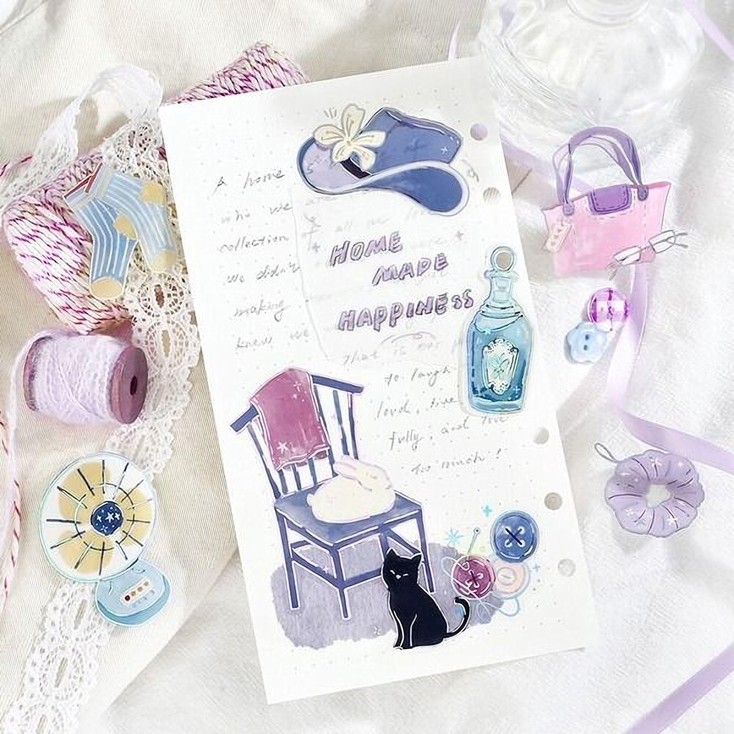 The image is a scrapbook page with various decorative elements, including a hat, a purse, a cat, and other home-related items. The page also contains handwritten text and illustrations, creating a personal and creative atmosphere.