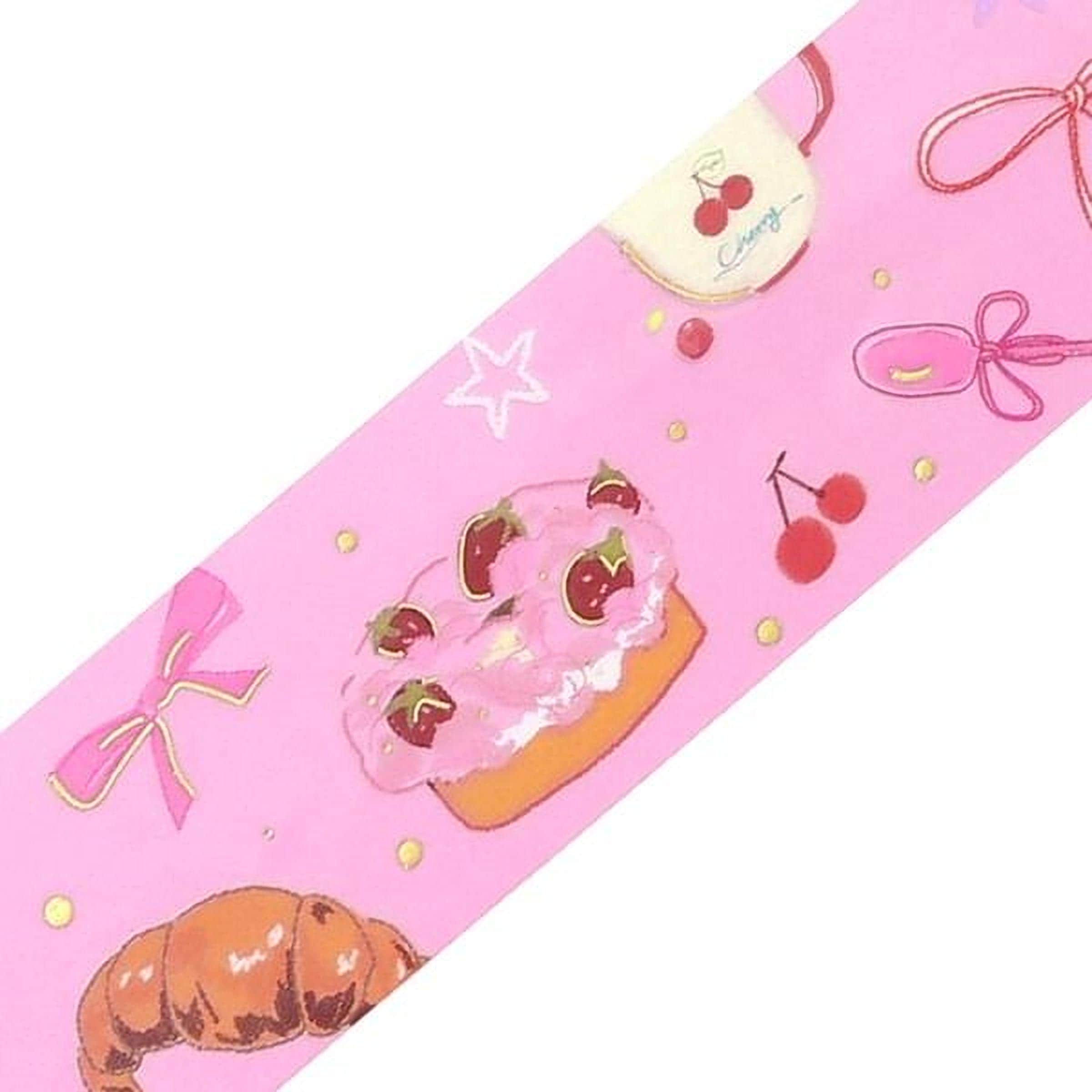 The image is a pink ribbon with various illustrations of pastries and desserts, including a croissant, a cupcake, and cherries.