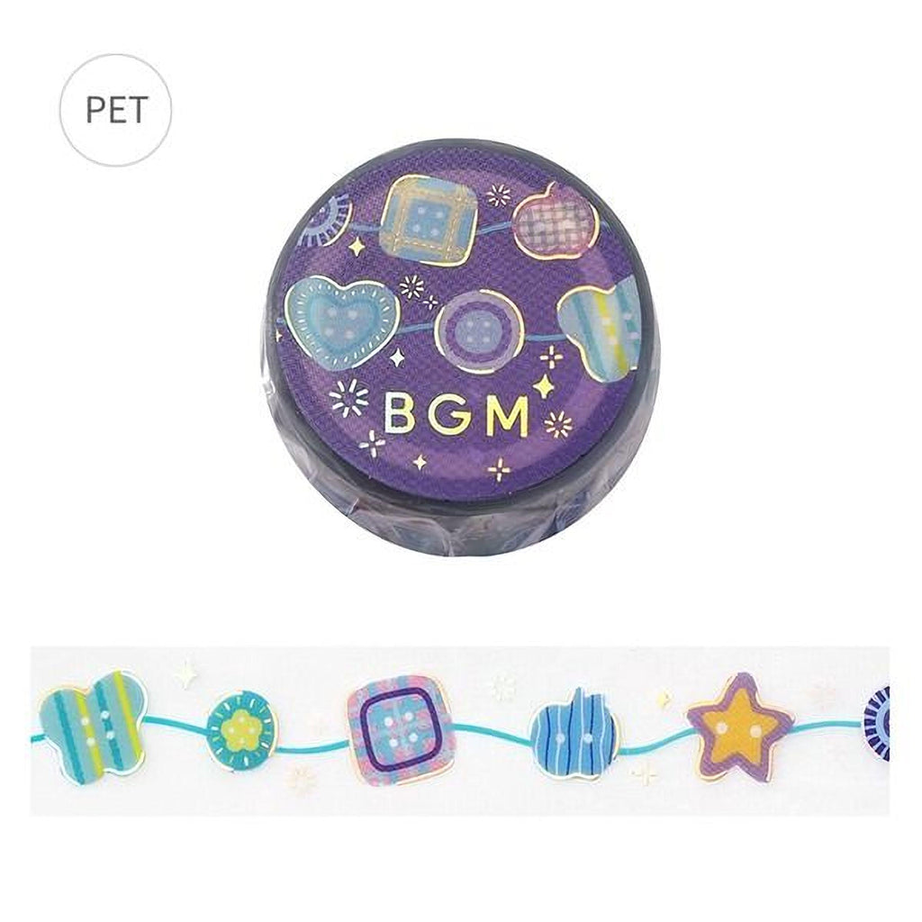a purple object with various colorful designs and shapes, including hearts, stars, and other decorative elements. The object appears to be a decorative item or a piece of art, possibly a pen holder or a decorative accessory.