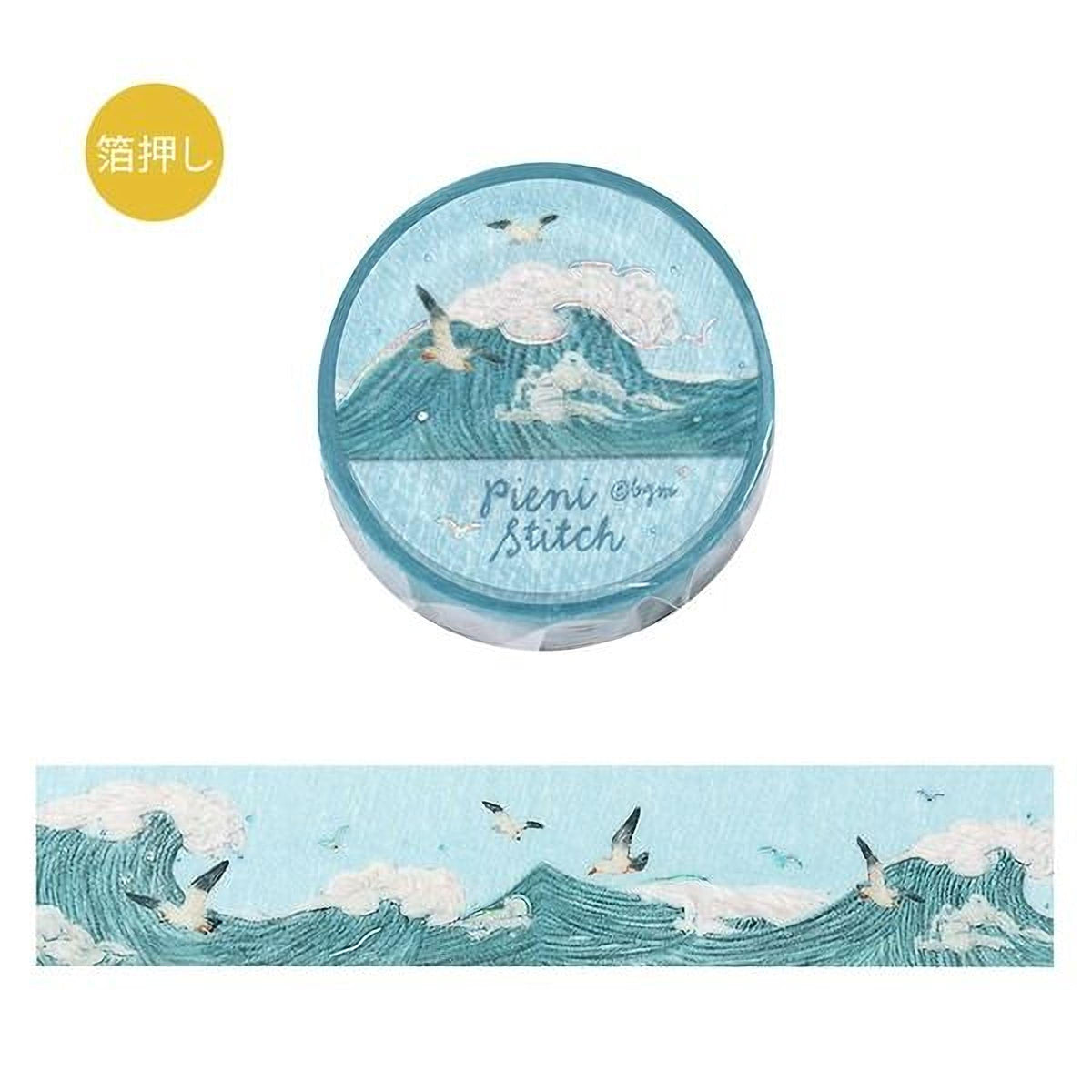 a round blue and white object with a wave design and birds flying above it. The object appears to be a decorative item or a piece of art.