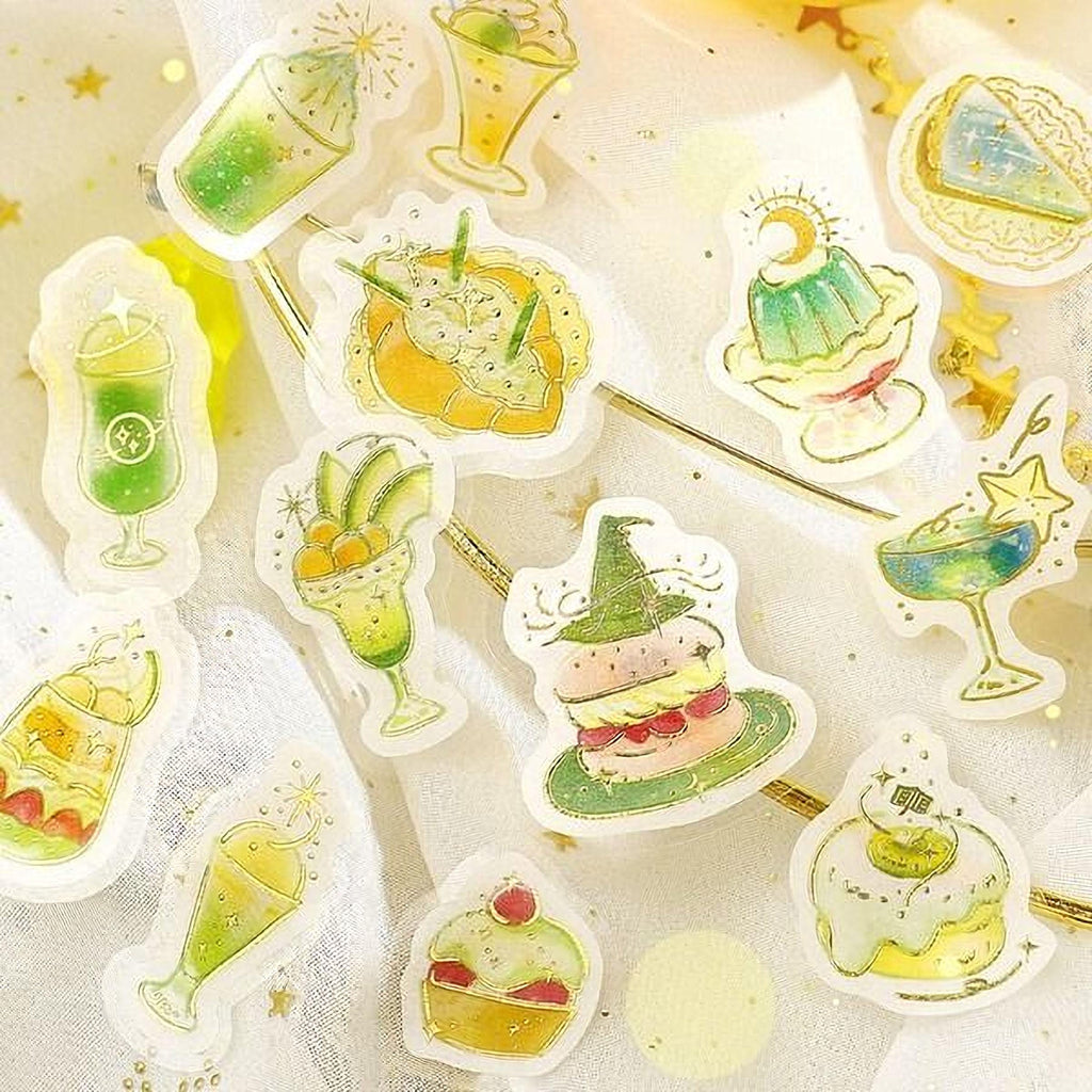 a variety of colorful and whimsical stickers depicting desserts and drinks, including cakes, ice cream, and other sweet treats.