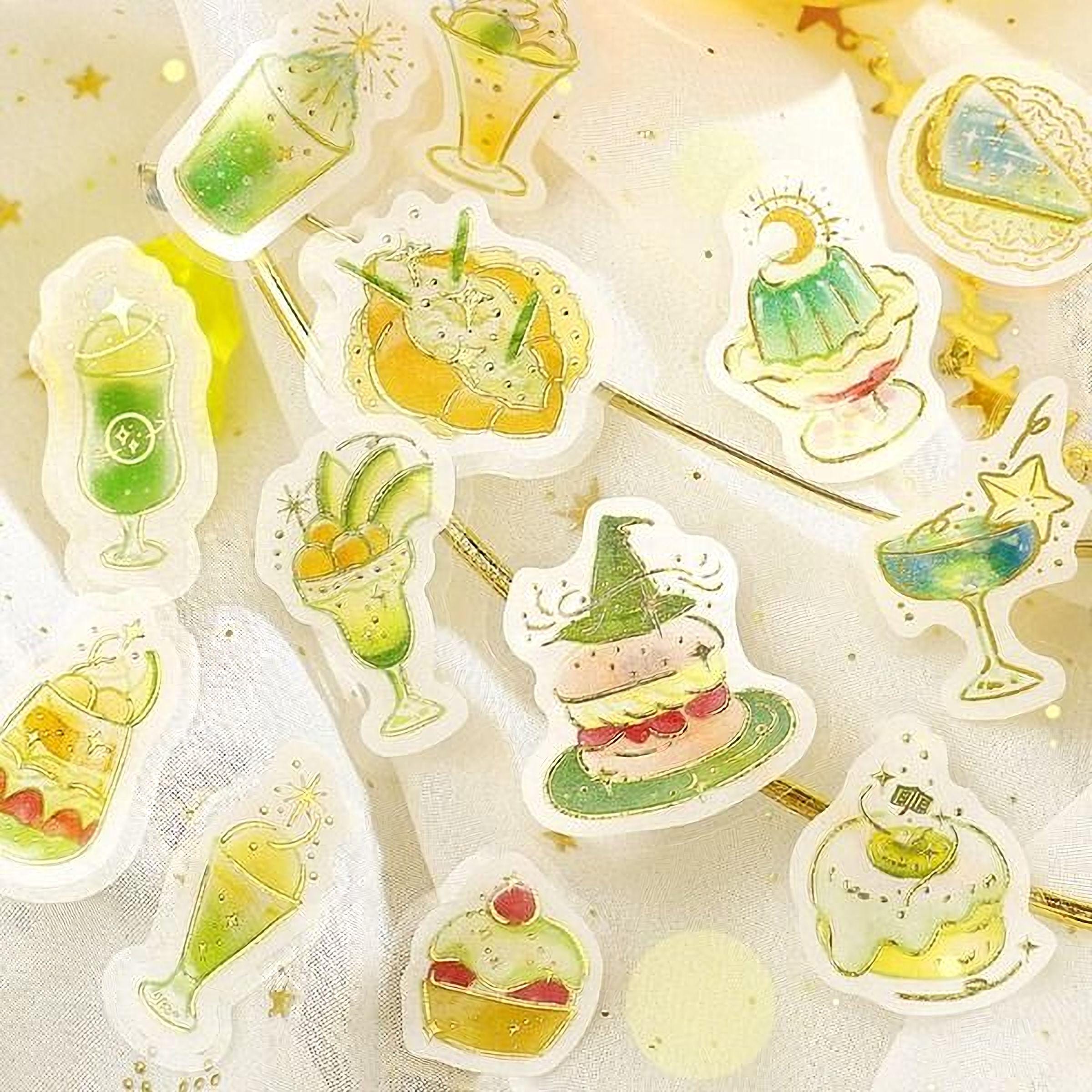 a variety of colorful and whimsical stickers depicting desserts and drinks, including cakes, ice cream, and other sweet treats.