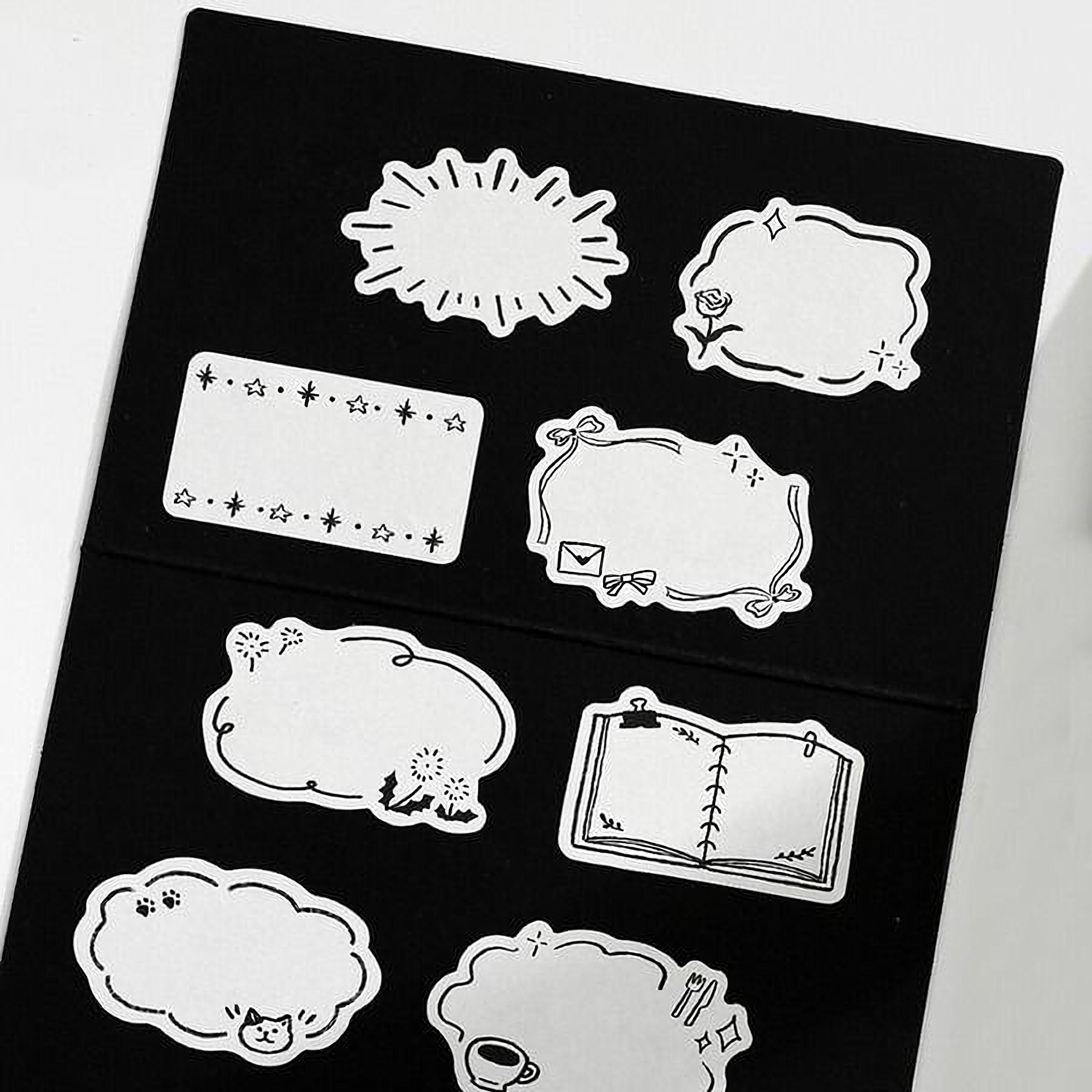 a collection of nine different shapes and symbols, including speech bubbles, flowers, and other abstract designs, all set against a black background.