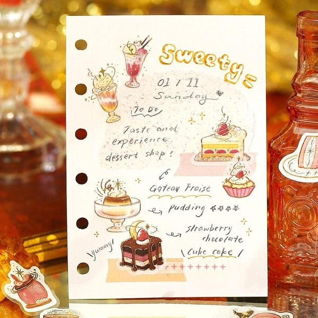 a handwritten note with illustrations of desserts, including a cake, ice cream, and a milkshake, along with the words "Sweety" and "Pudding".