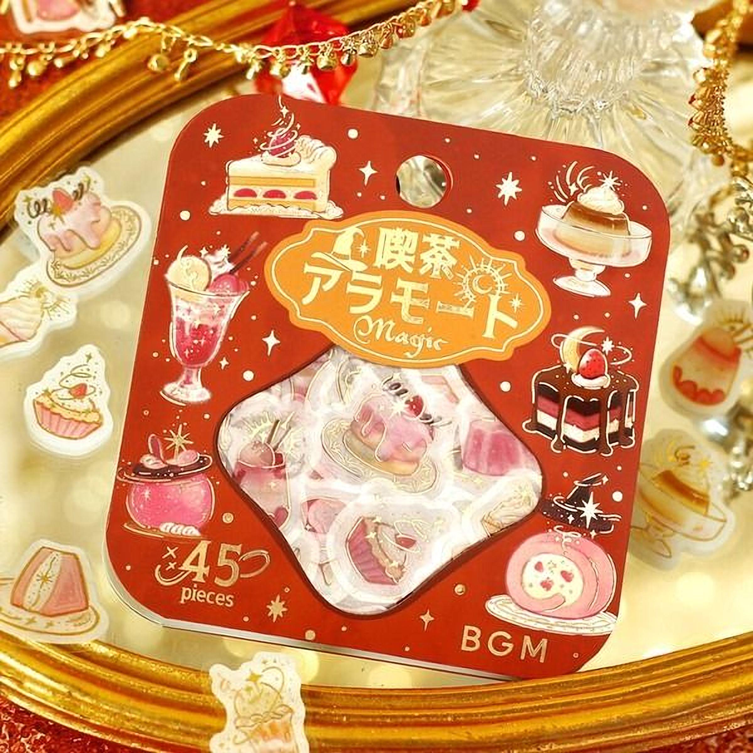 a red and gold sticker pack with various desserts and pastries, including cakes, pies, and other sweet treats. The pack appears to be a collection of stickers, each depicting a different dessert or pastry.
