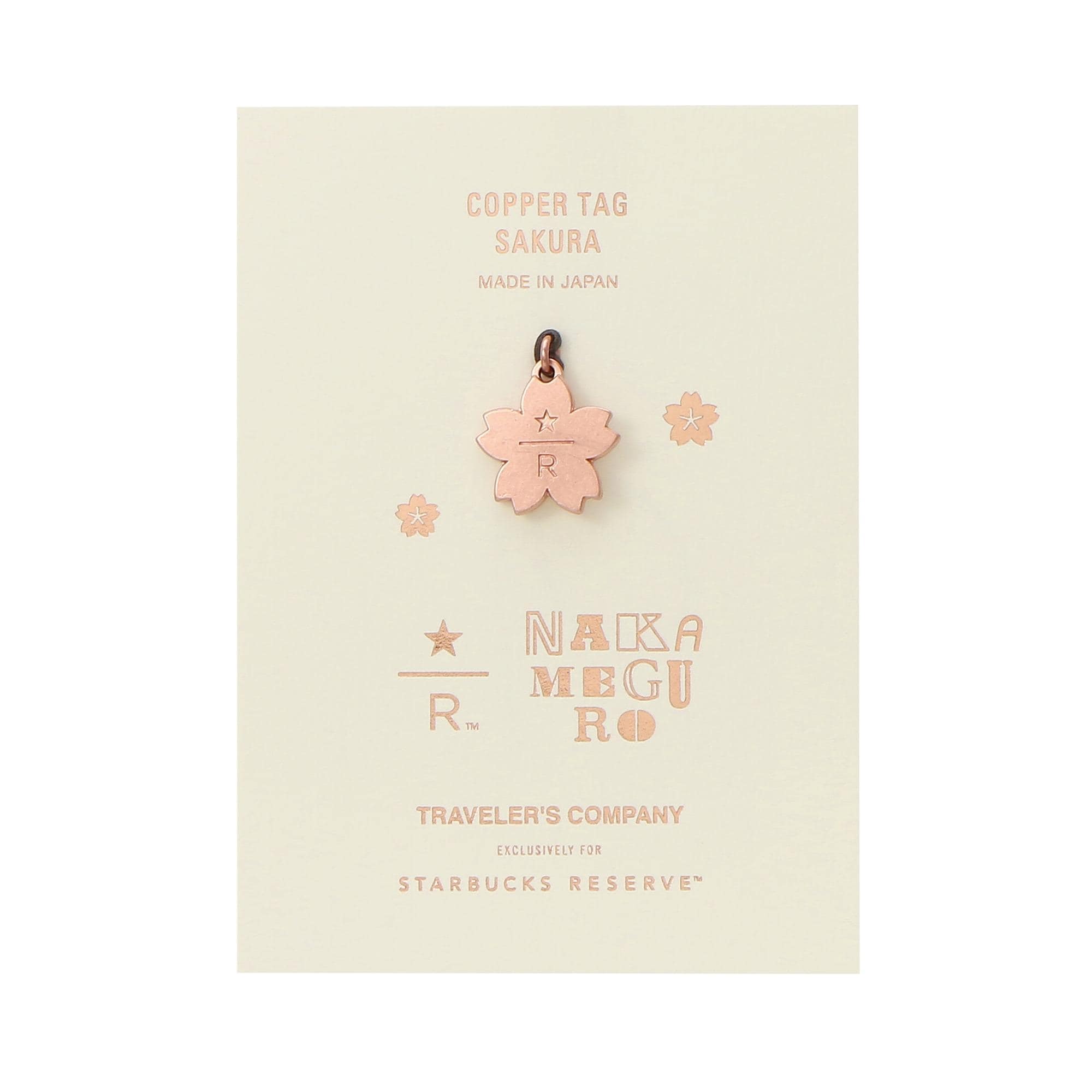 The image is a promotional material for a copper tag featuring a cherry blossom design, with text and logos related to the brand.