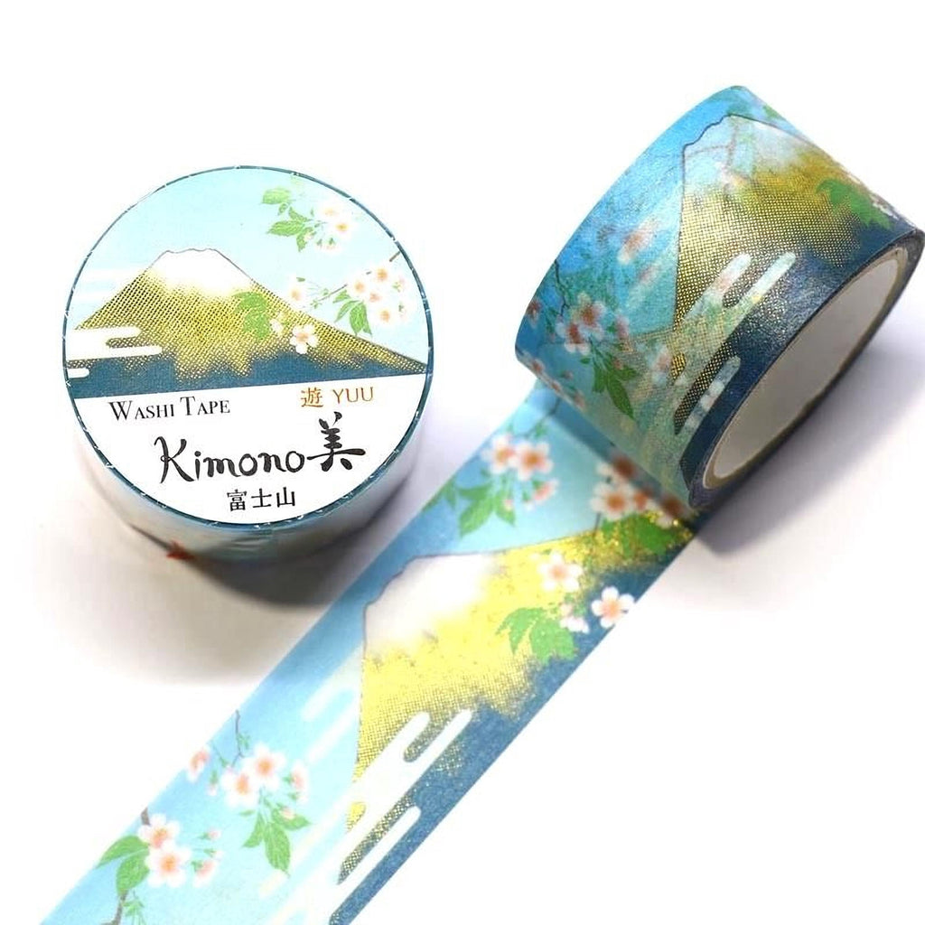 a roll of washi tape with a floral design and a round container with a similar design.