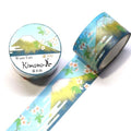 a roll of washi tape with a floral design and a round container with a similar design.