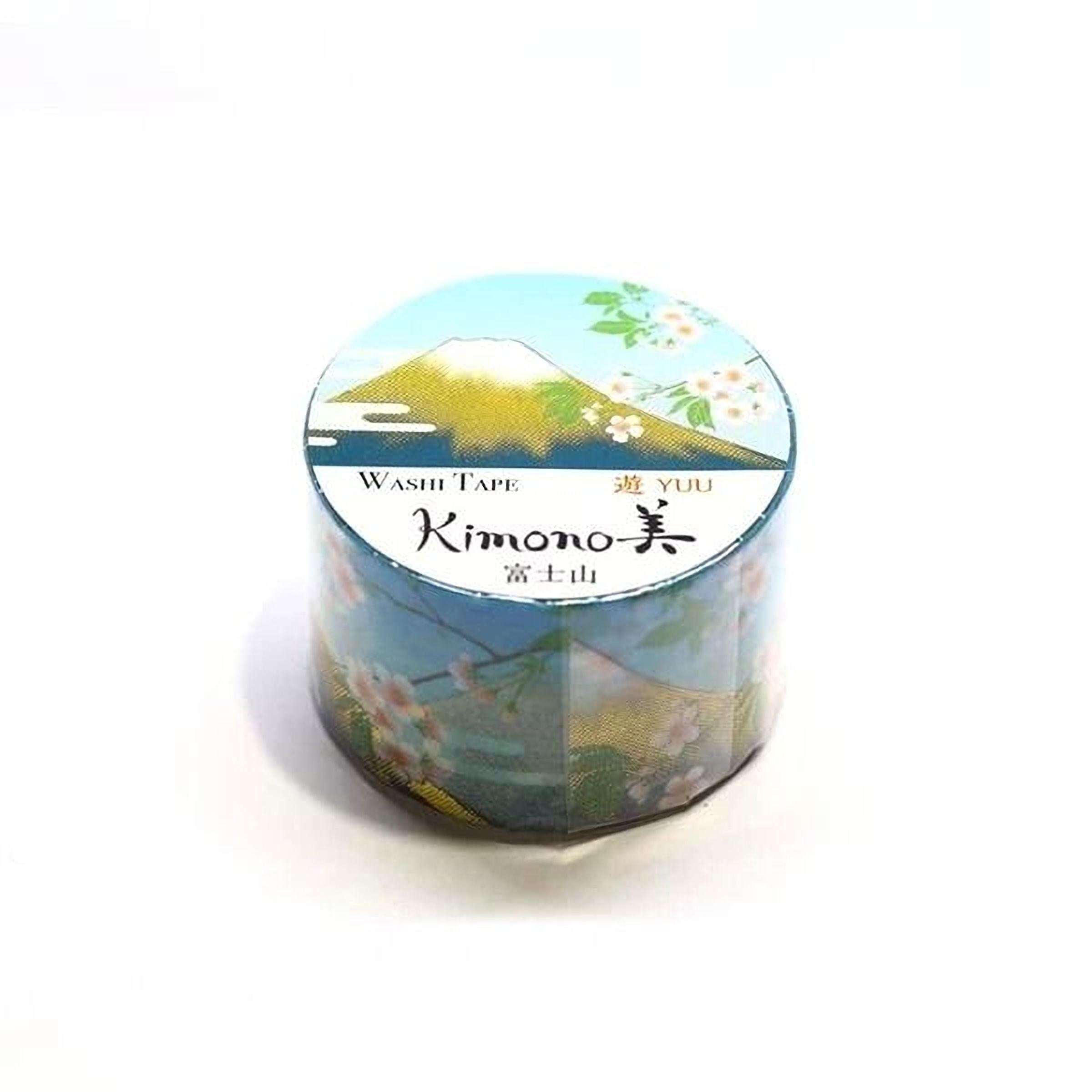 A cylindrical container with a design featuring a mountain and cherry blossoms, along with the text "YUU Kimono" printed on it.