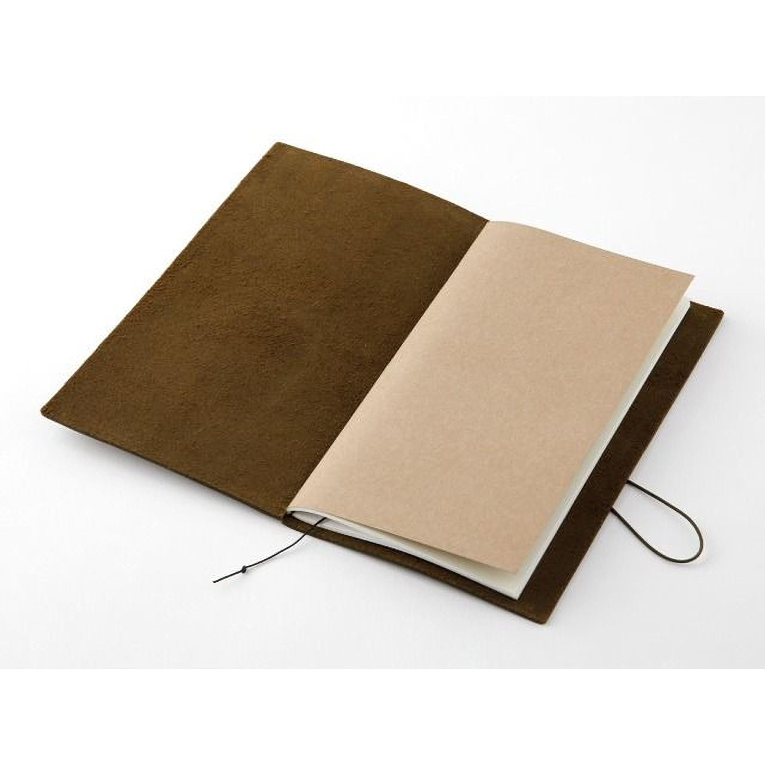 An open brown leather-like notebook with a blank beige page inside, resting on a white surface.