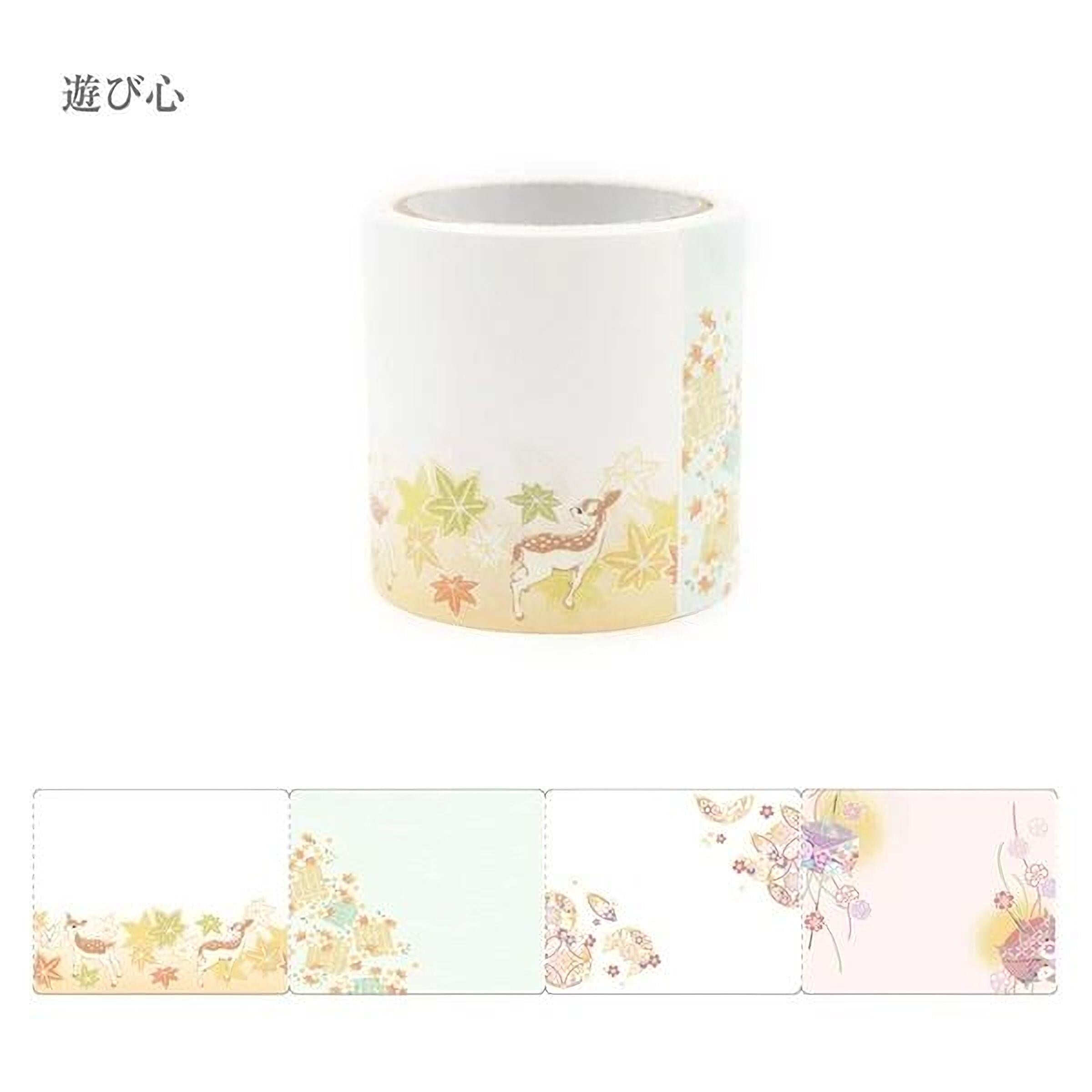 A white cylindrical object with a decorative design featuring a deer and autumn leaves.