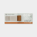 a tan and brown pen holder with a gold-colored metal clip, designed for use with a notebook.