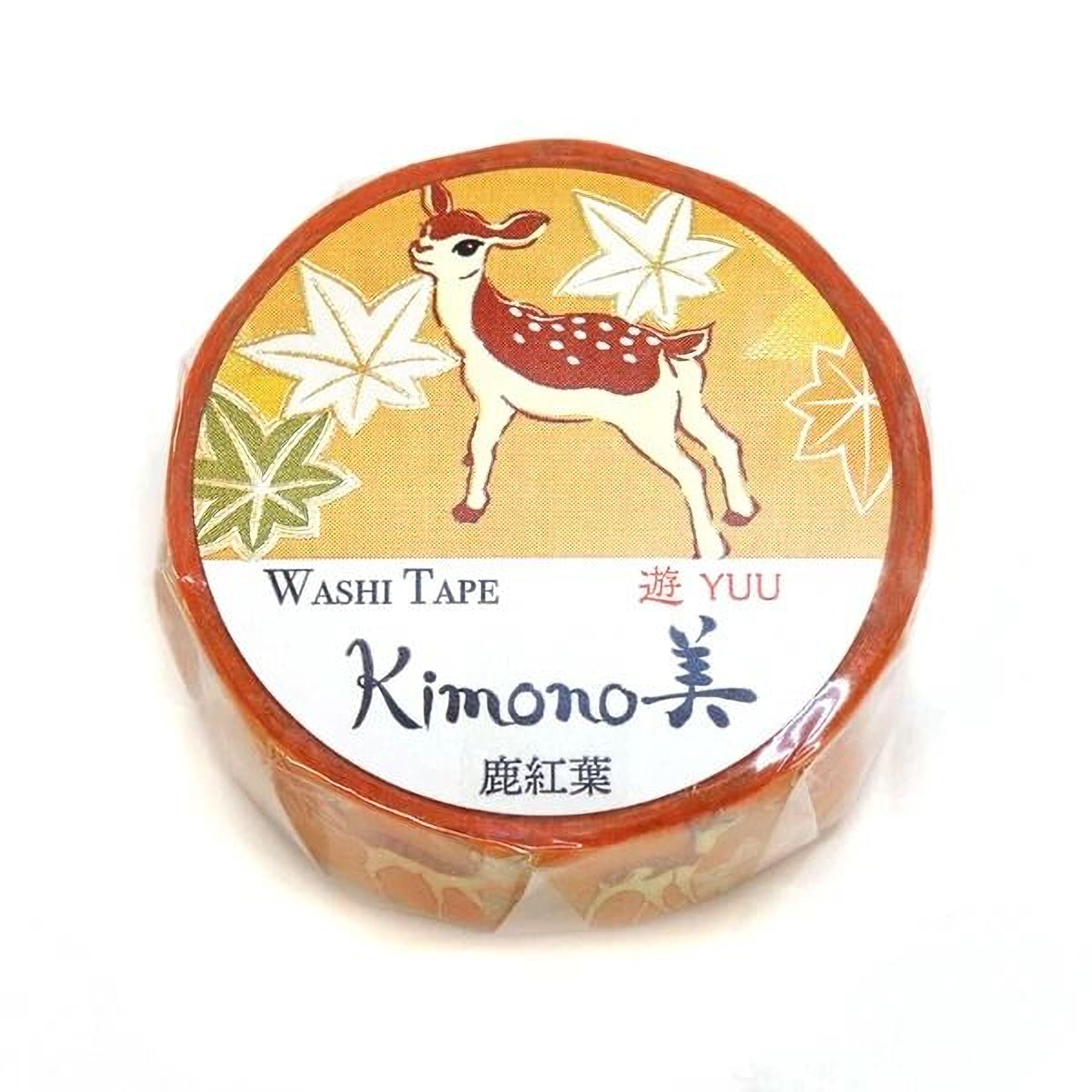 A round, orange-colored roll of washi tape with a design featuring a deer and leaves.