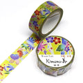 a roll of colorful washi tape with a floral pattern and a round container of the same tape.