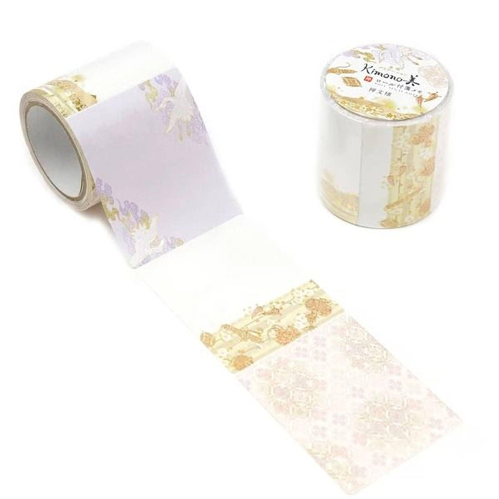 a roll of decorative tape with a floral pattern and a cylindrical container with a similar floral pattern on top.