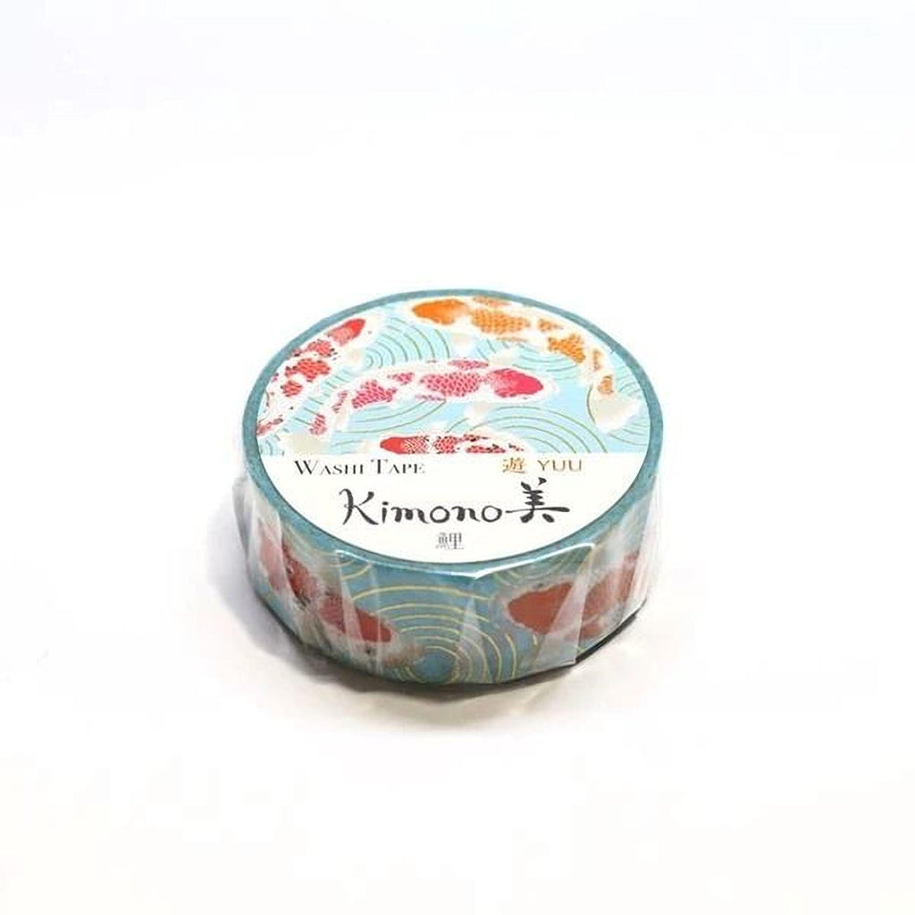 A roll of washi tape with a colorful fish pattern on it.