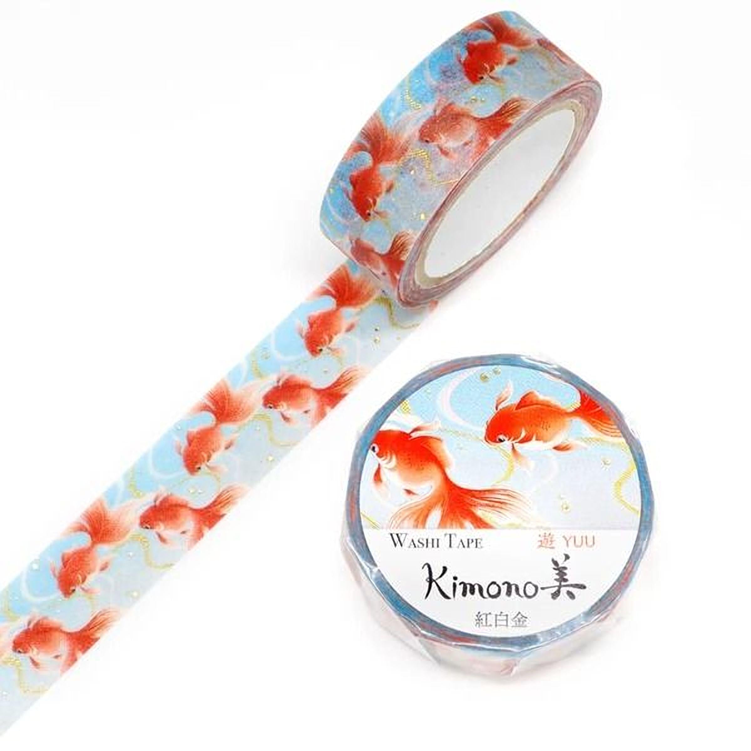 a roll of washable tape with a pattern of orange fish on a blue background, and a round label with text and an image of the same fish pattern.