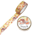 a roll of washable tape with a floral pattern and a round label with Japanese text.