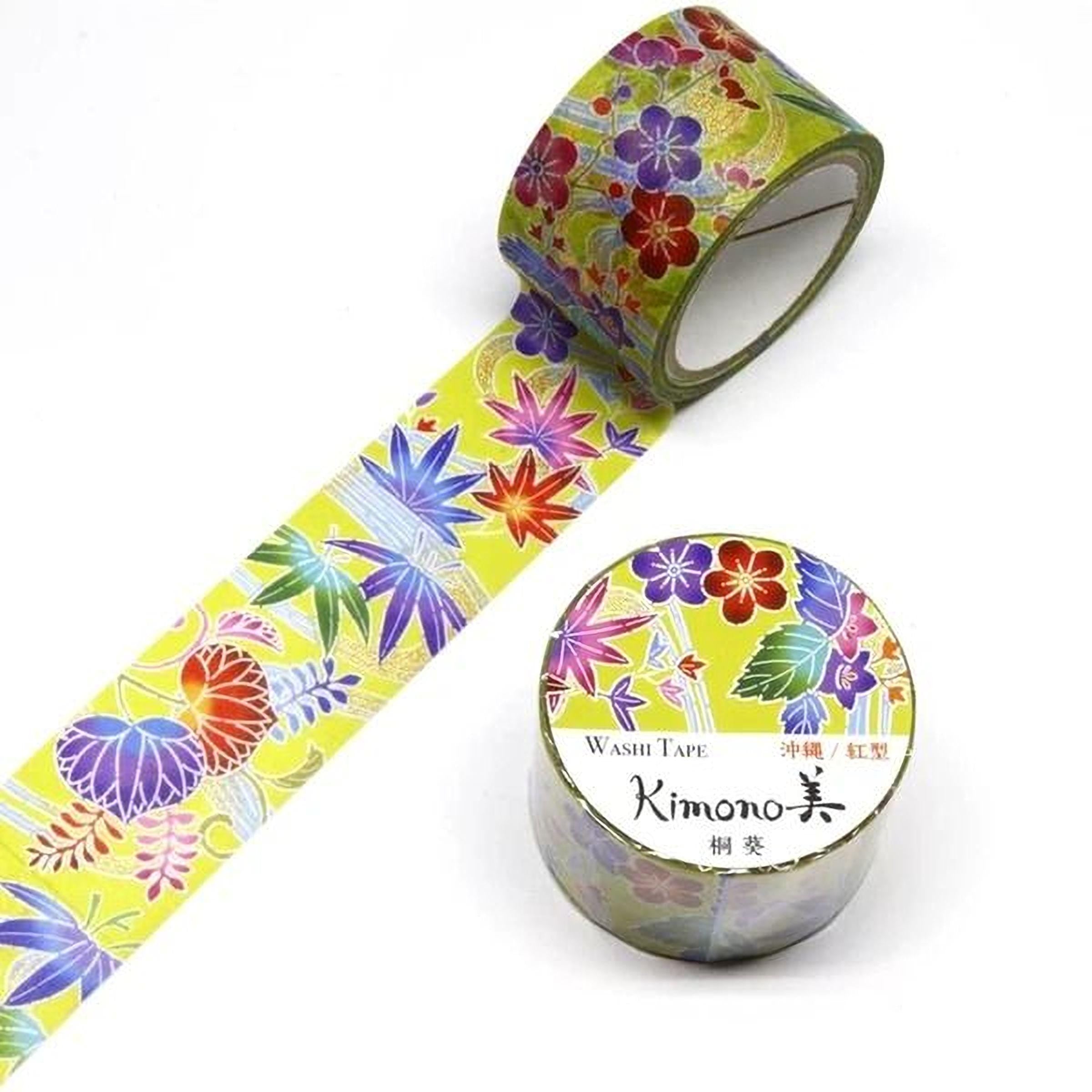 a roll of colorful washi tape with a floral pattern and a round container with a label that reads "Kimono" and "WASH TAPE" in Japanese.