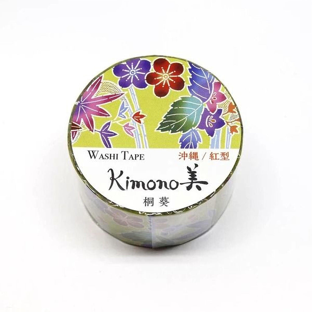 A round container of Washi Tape with a floral design on the lid.
