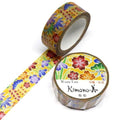 two rolls of colorful washi tape with floral patterns, one of which is partially open.