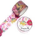 a roll of washable tape with a floral pattern and a round container with Japanese text on it.
