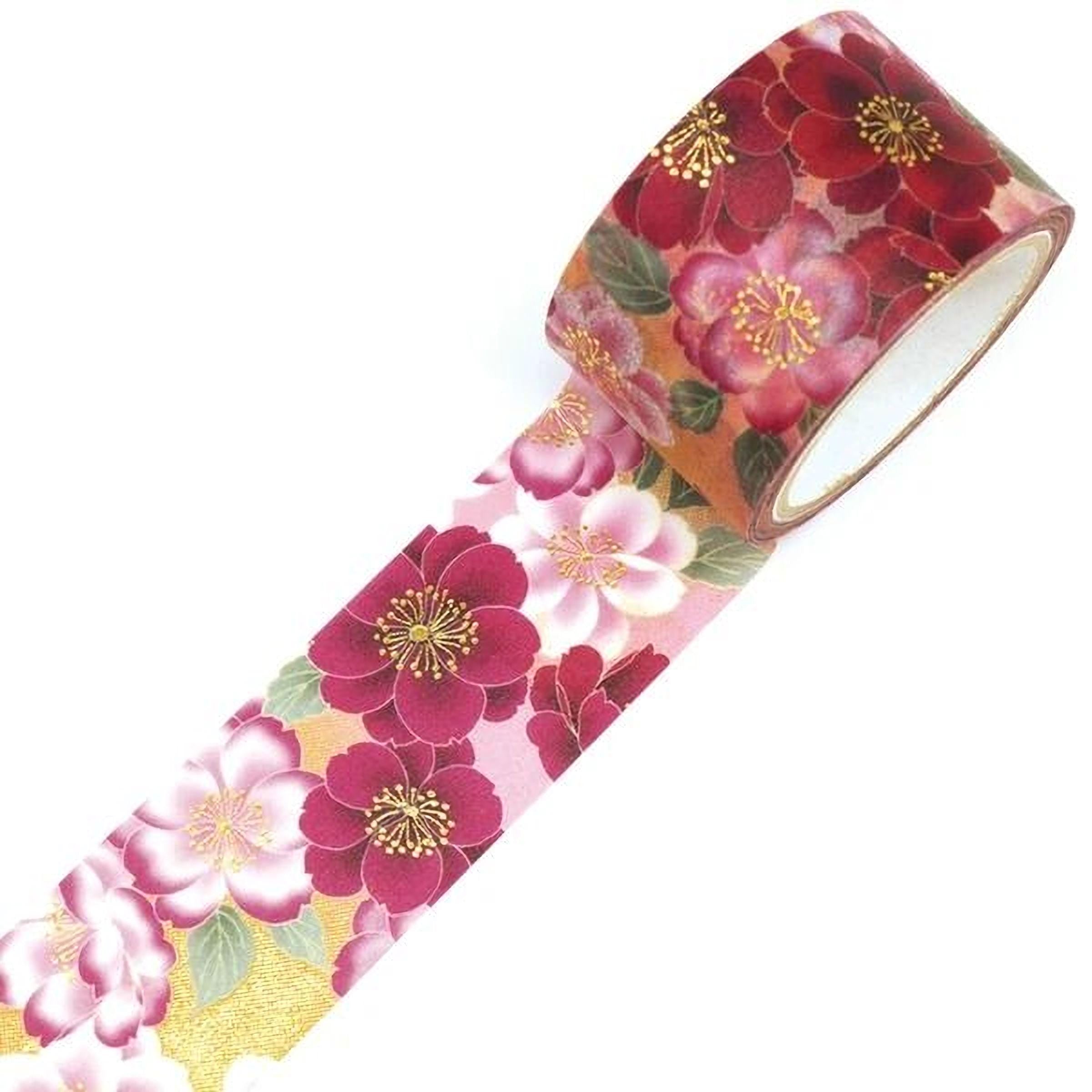A roll of floral patterned tape with red and pink flowers on it.