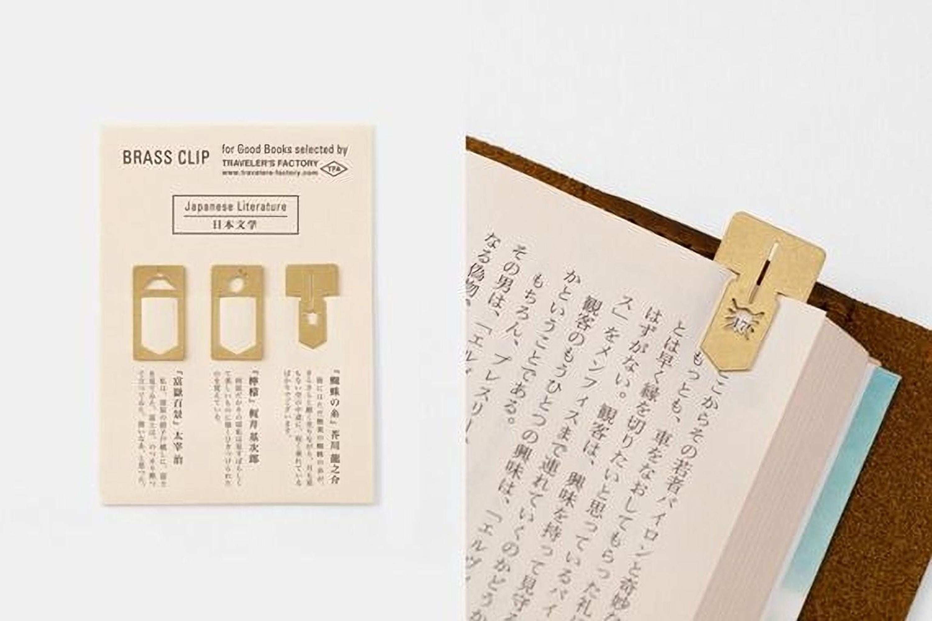 a book with a brass clip on the right side, and there is a card with information about the brass clip on the left side.