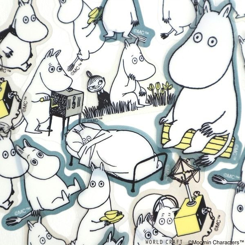 a collage of various cartoon character stickers, including Moomins, arranged in a playful and whimsical manner.