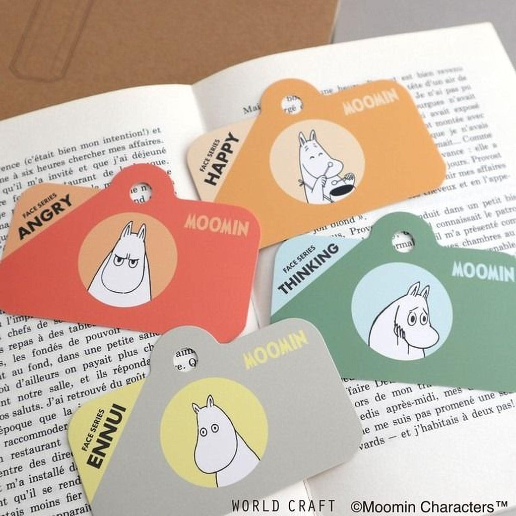 a collection of colorful character cards with illustrations of Moomin characters, including Angry, Happy, Thinking, and Enni.
