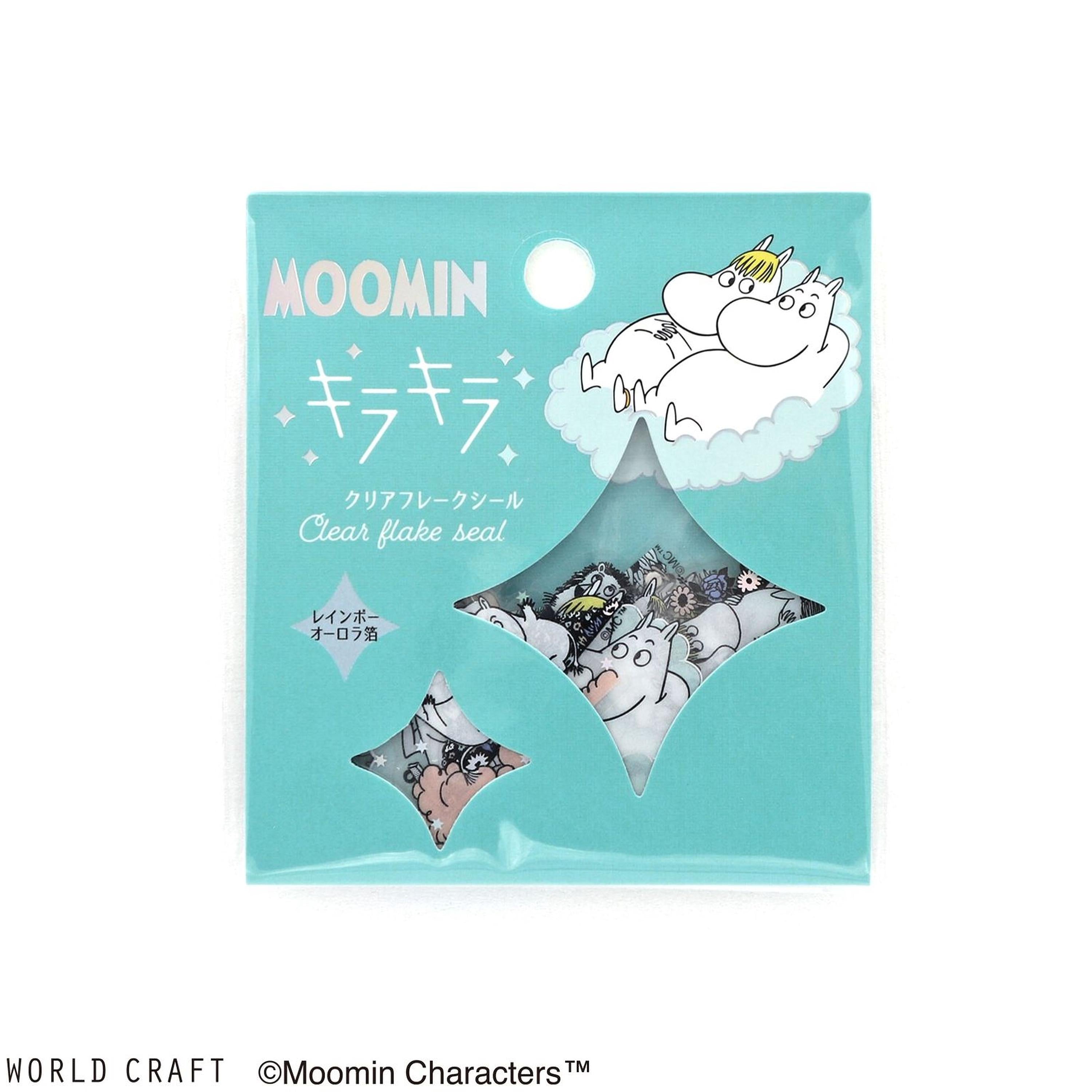 The image is a package of Moomin characters, specifically Moomin, with a clear plastic window revealing the characters inside.