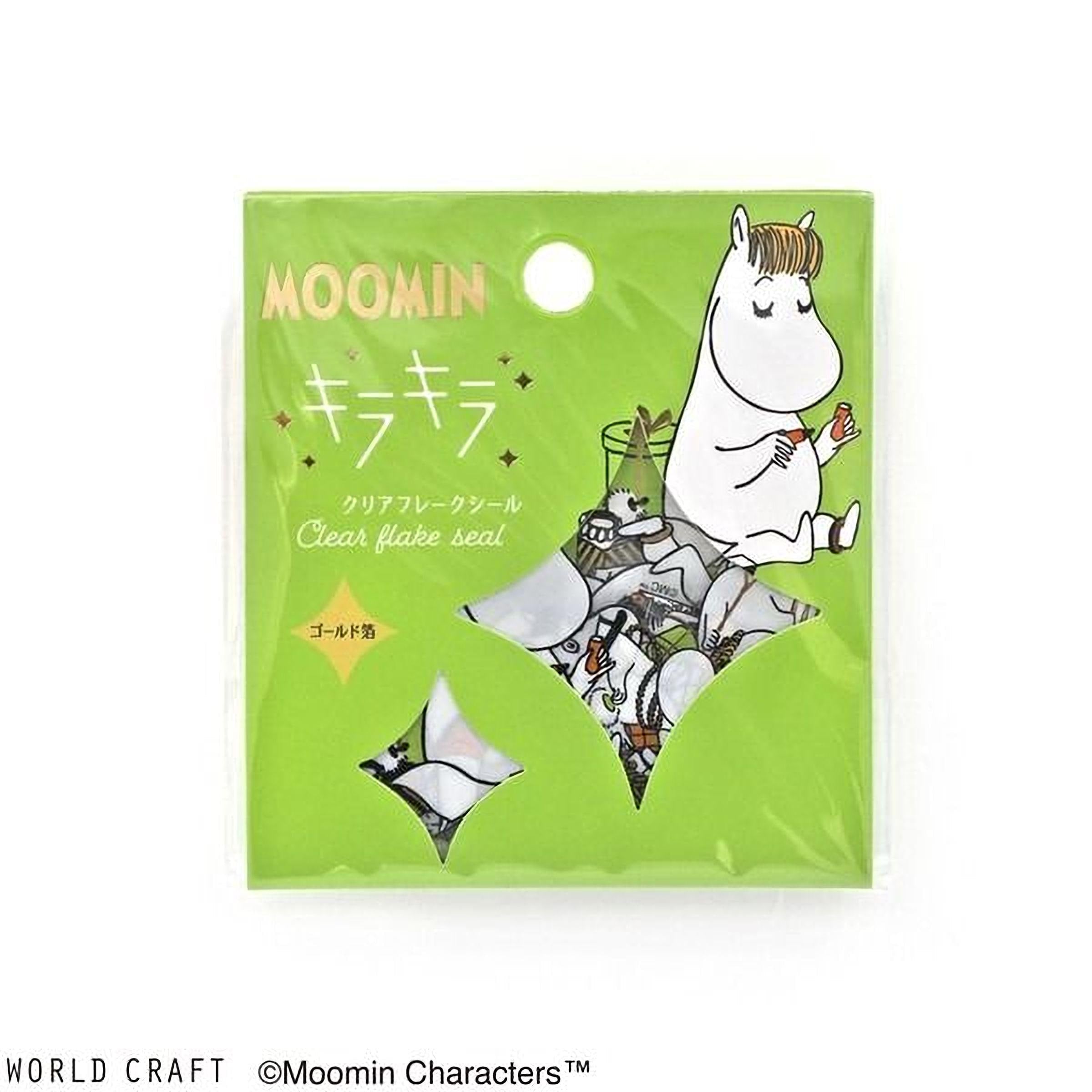 The image is a product packaging for Moomin characters, featuring a cartoon illustration of Moomin and a clear plastic bag with a green background.