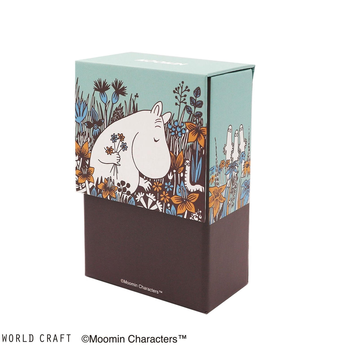 A box featuring a cartoon illustration of a white mohawk holding flowers and surrounded by a colorful, whimsical garden scene.
