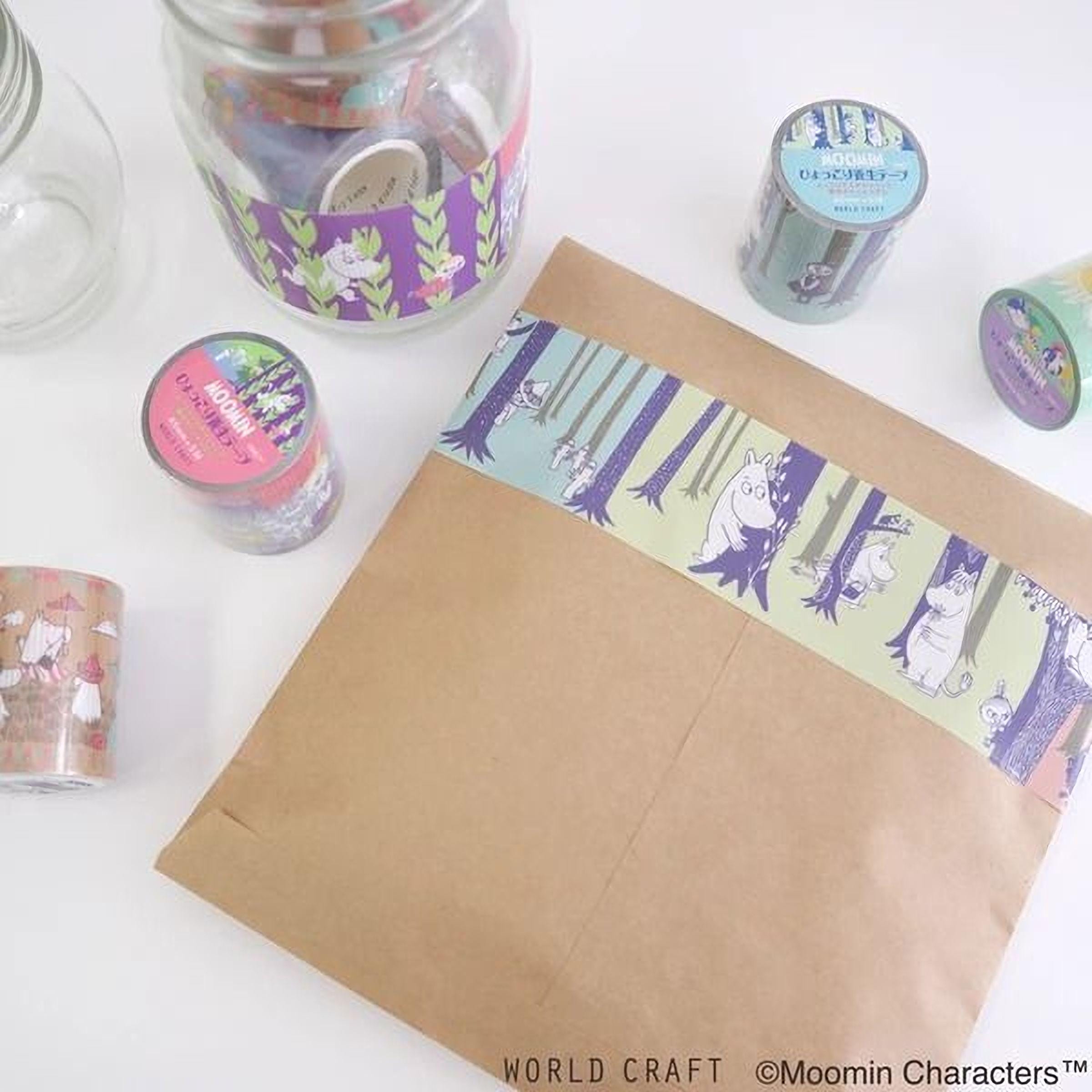 various items, including a brown envelope, a jar, and some tape rolls, all with colorful and whimsical designs.