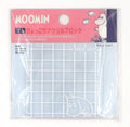 The image is a package of Moomin craft supplies, including a grid pattern and a character illustration.