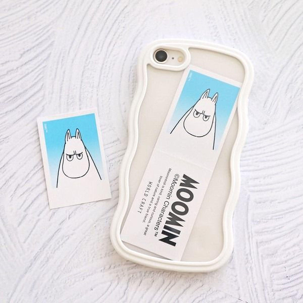 a white phone case with a sticker and a small picture of a cartoon character.