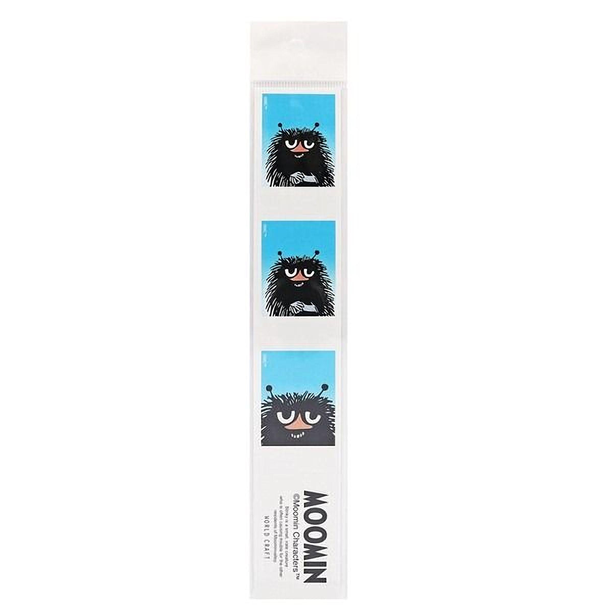The image is a single, vertical strip of paper with a cartoon character on it.