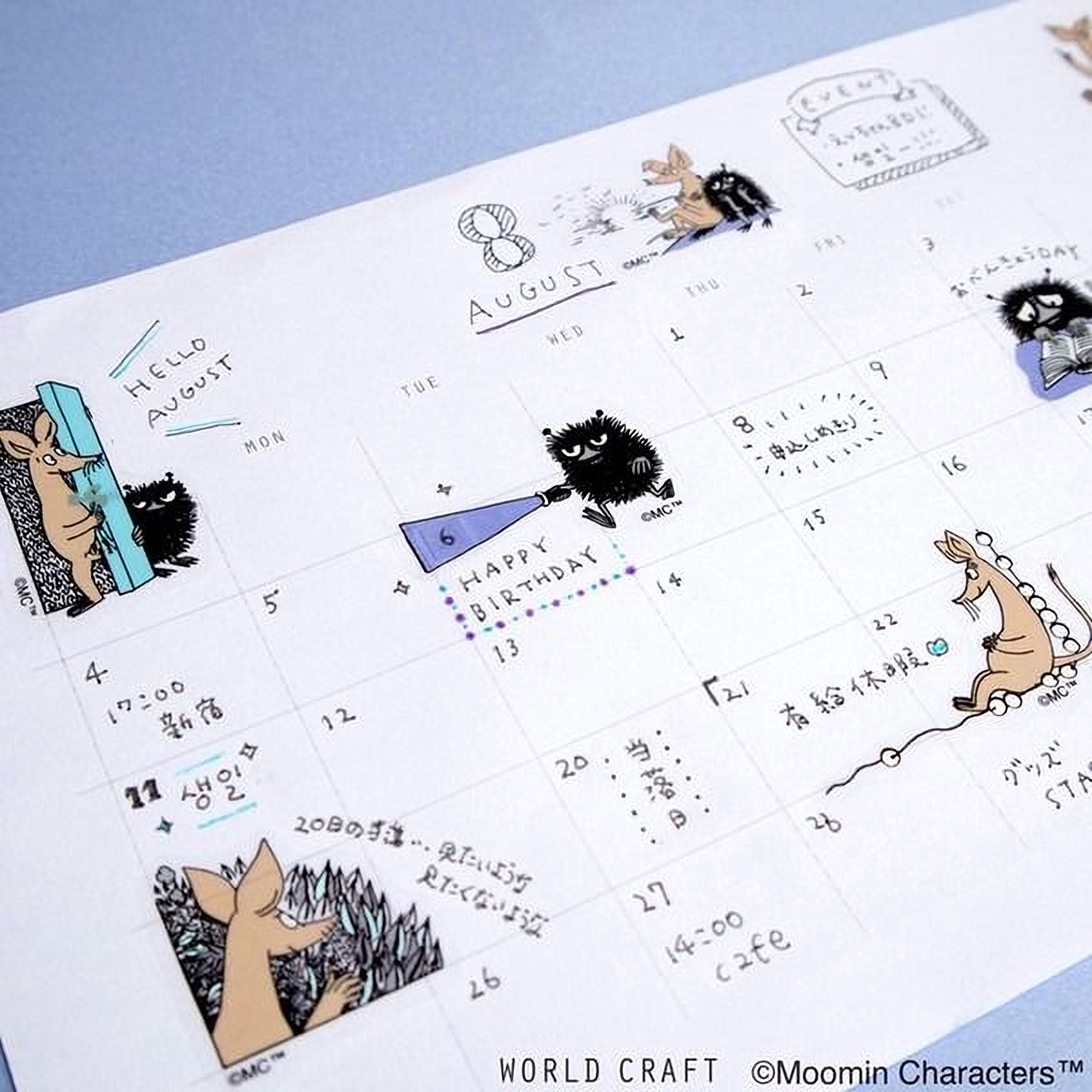The image is a calendar with various illustrations and text, including a kangaroo, a cat, and other animals. The calendar is set against a blue background and appears to be a creative and personalized calendar.