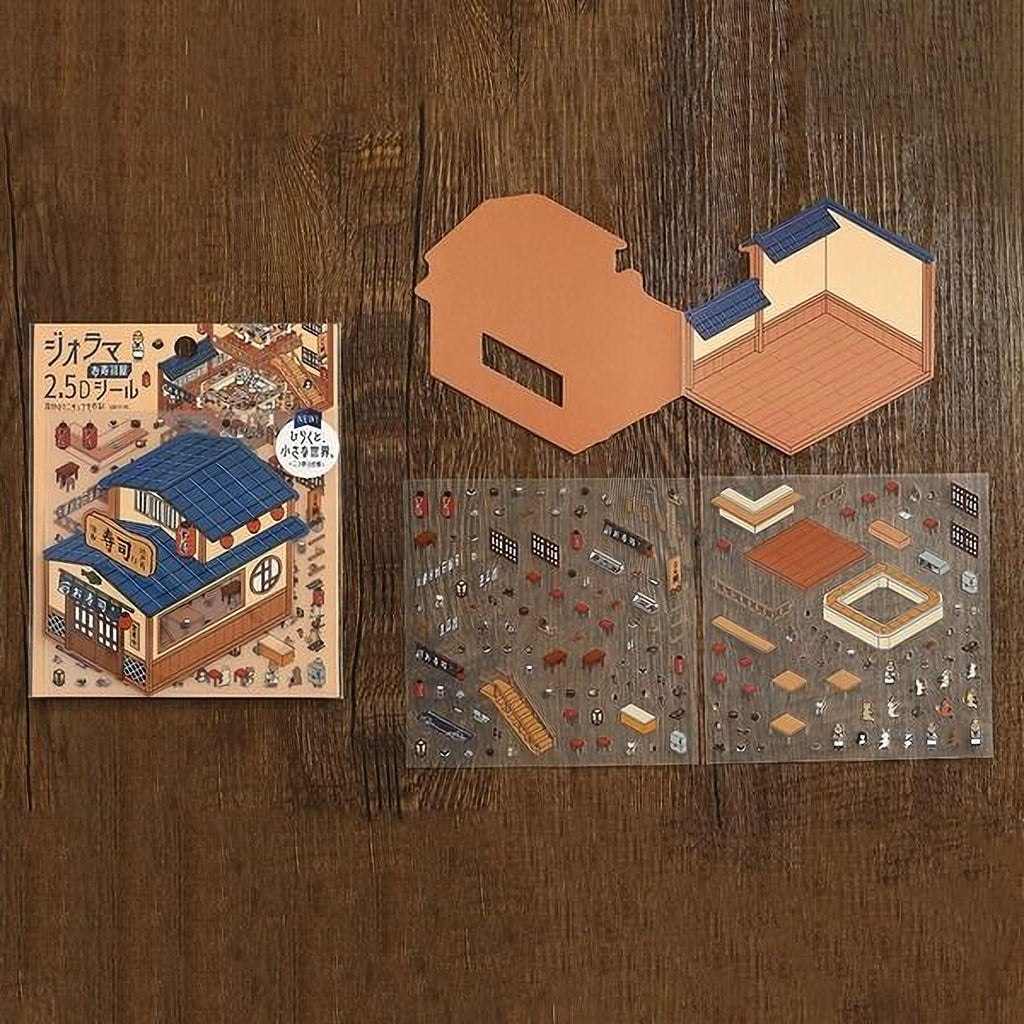 The image is a collection of various paper cutouts and a book cover, all displayed on a wooden surface.