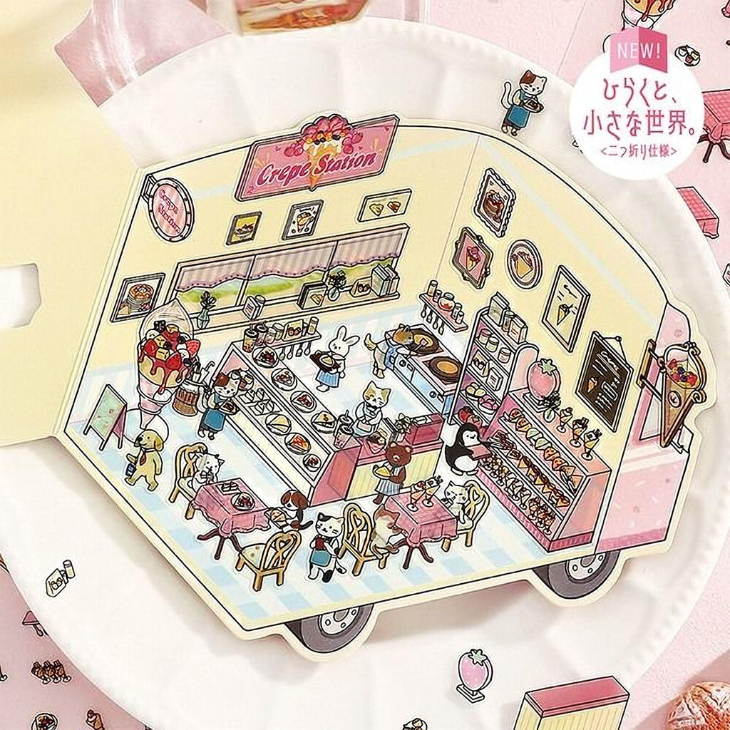 A colorful illustration depicting a whimsical crepe shop with various food items and animals, including a dog, cat, and bird, all interacting in a lively and playful environment.