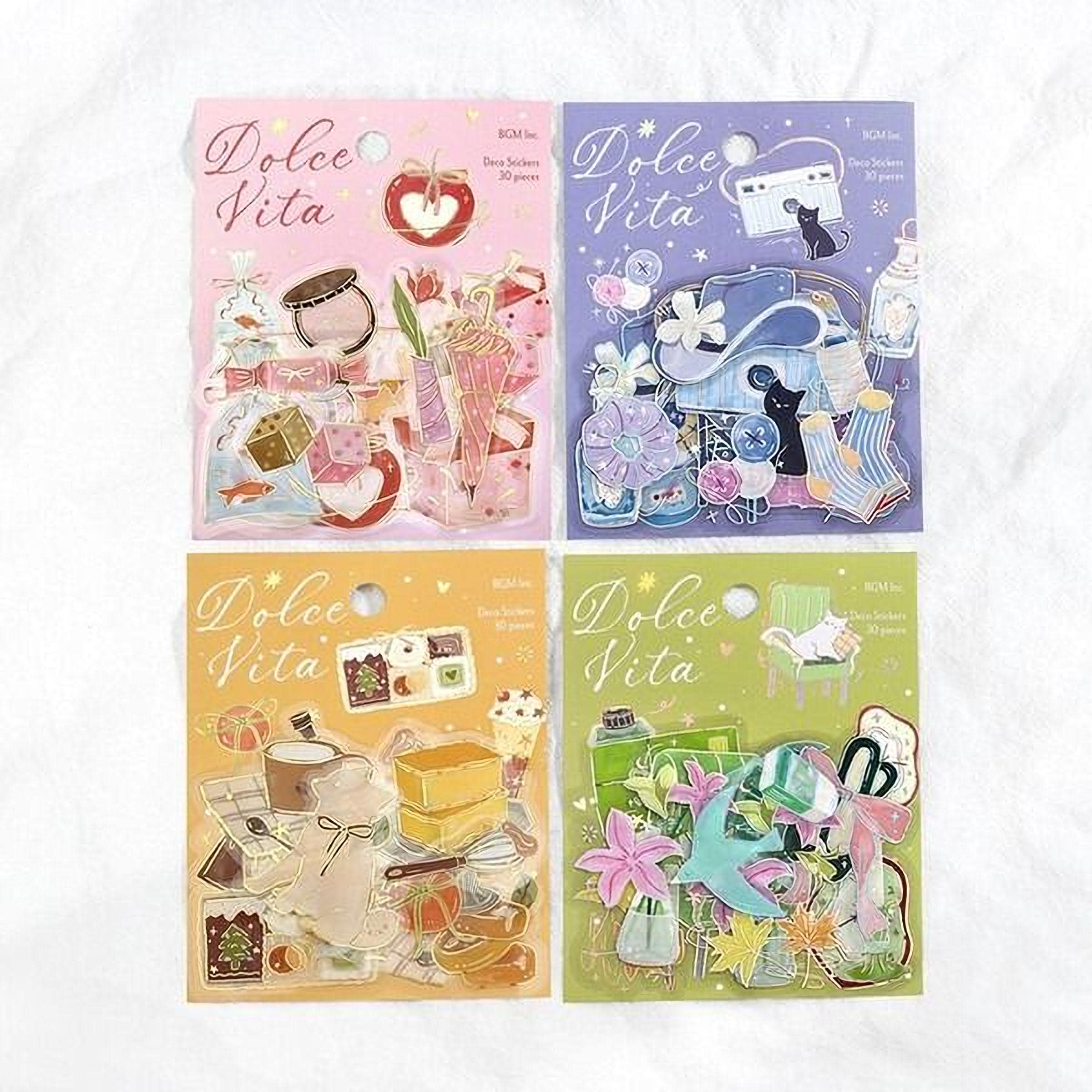 four colorful stickers with various illustrations and text, including the word "Dolce Vita" and other decorative elements.