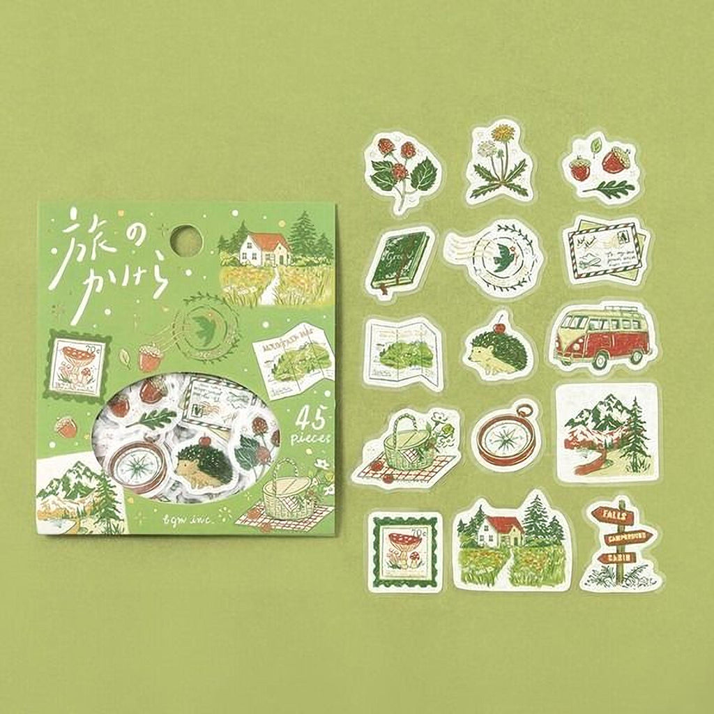 a collection of colorful stickers and a green box with stickers, all set against a green background.