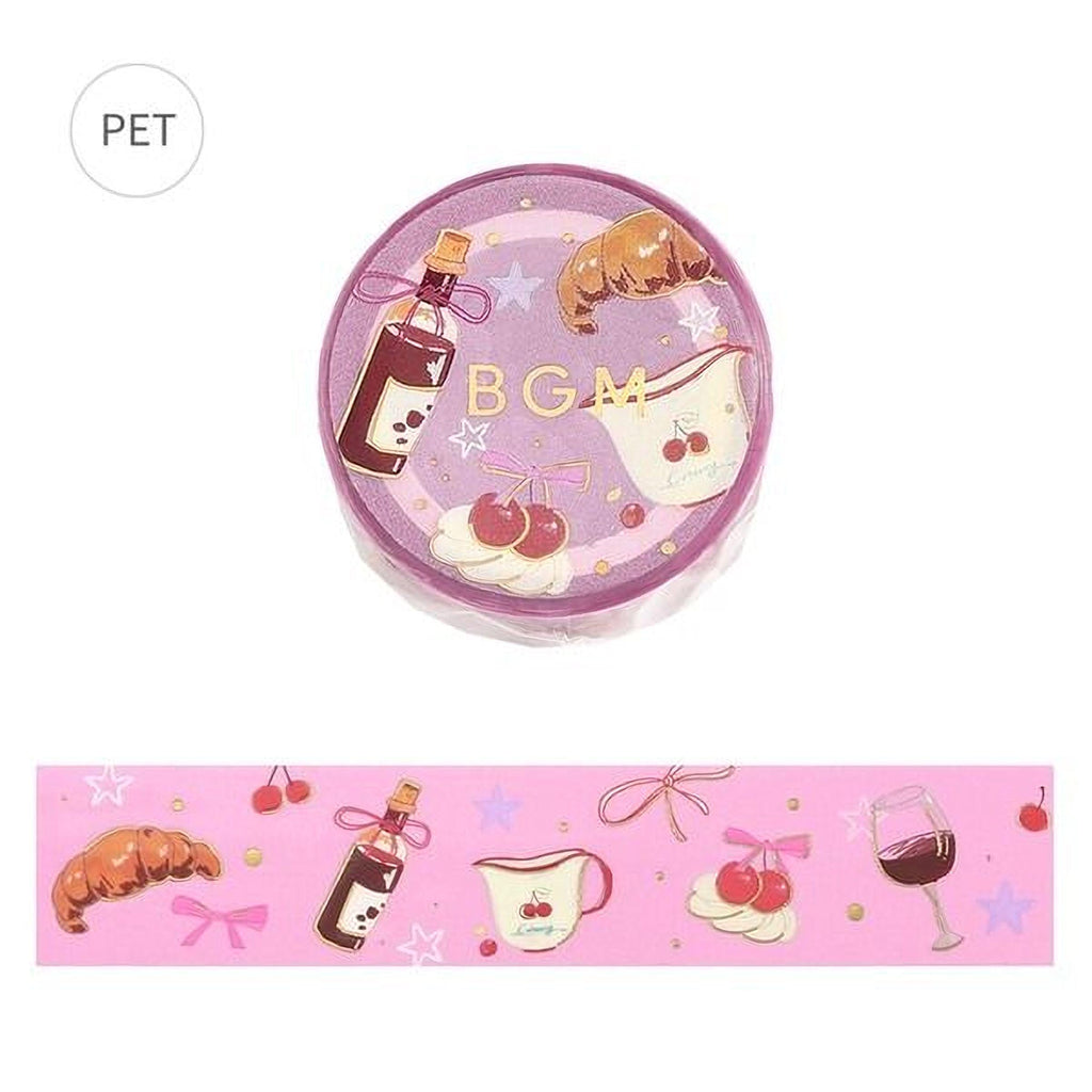 a pink and purple circular object with various illustrations and text, including a bottle, a wine glass, cherries, and stars.