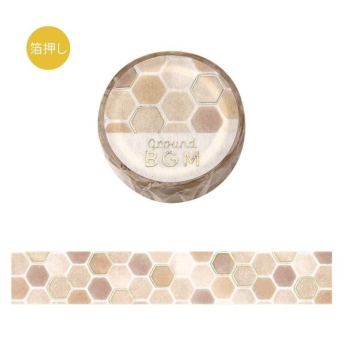 a circular object with a honeycomb pattern and the text "Ground BGM" printed on it.