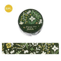 a green and white floral pattern on a round object, which appears to be a piece of paper or a decorative item. The object has a floral design with leaves, flowers, and branches, and the text "Pier Stitch" is written on it.
